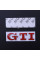 Емблема напис GTI скотч 3М 75 мм металева Польща