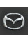 Емблема для Mazda 626 / 323 пластикова 63 x 50 мм