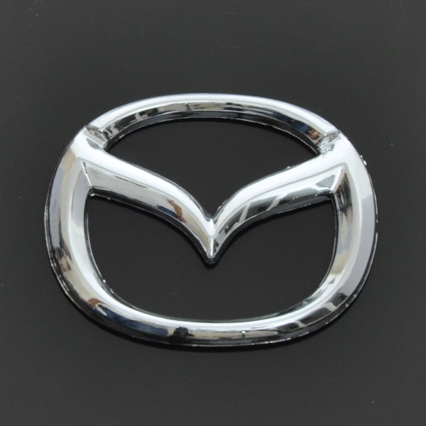 Емблема для Mazda 626 / 323 пластикова 63 x 50 мм