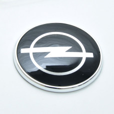Емблема для Opel 72 мм пластикова чорна Xром Cкотч