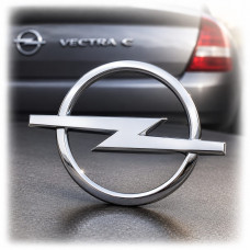 Емблема для Opel Vectra C Combo рівна 100 x 131 мм пластикова скотч