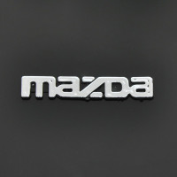 Эмблема надпись Mazda новая малая скотч 90 x 15 мм