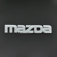 Эмблема надпись Mazda малая скотч 90 x 15 мм