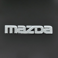 Эмблема надпись Mazda малая скотч 90 x 15 мм