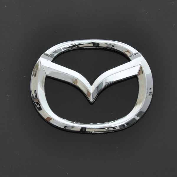 Емблема для Mazda 626 пластикова 85 x 65 мм